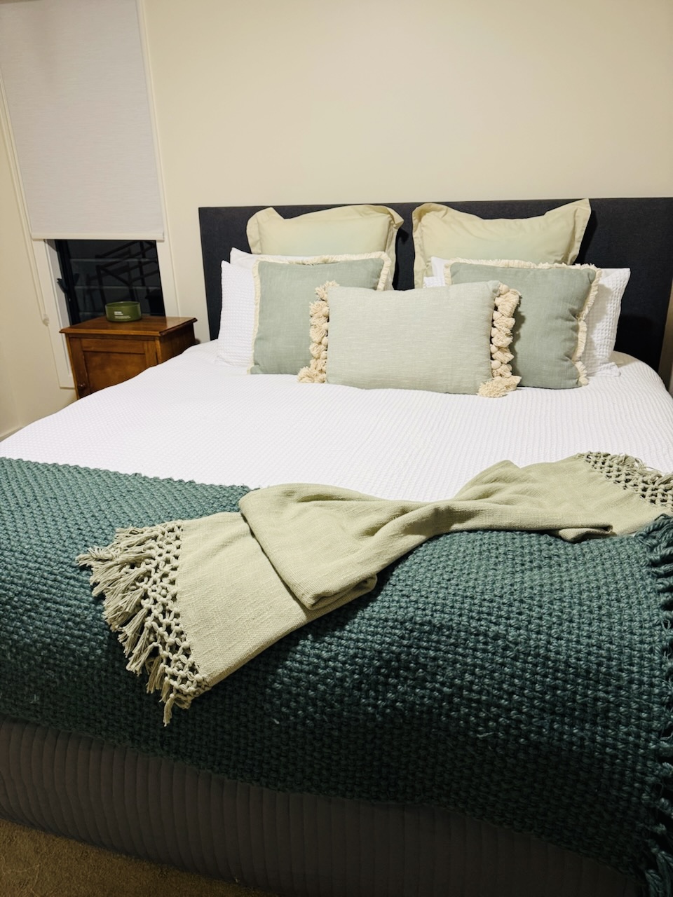 A guest bedroom styled and presented for the next Airbnb arrival